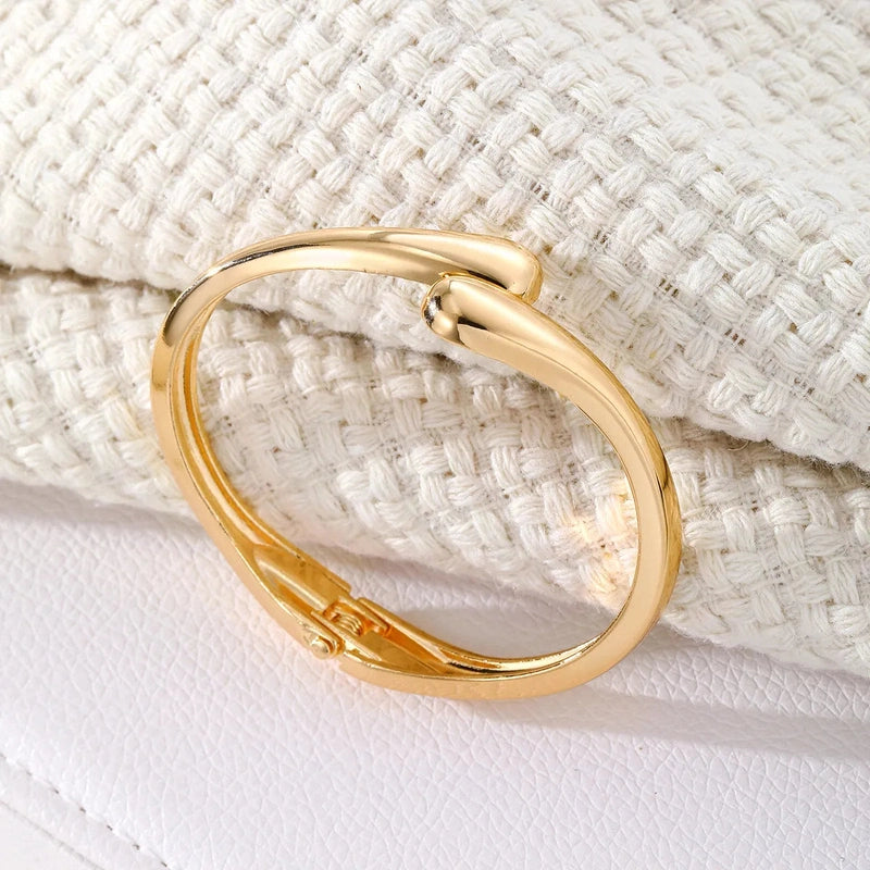 Bracciale Rigido Scultoreo Lucido – Accessorio Elegante Donna 2025 TIAMUSE Bracciali