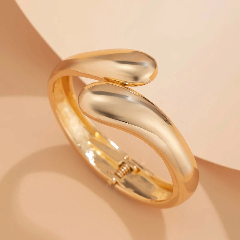 Bracciale Rigido Scultoreo Lucido – Accessorio Elegante Donna 2025 TIAMUSE Bracciali