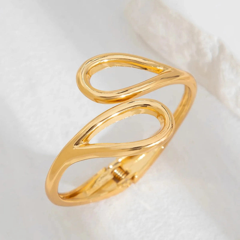 Bracciale dorato con struttura a molla – Il tocco finale per uno stile deciso TIAMUSE ACCESSORI
