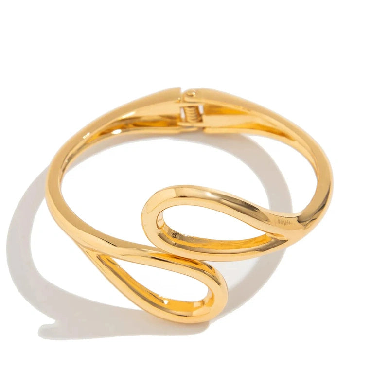 Bracciale dorato con struttura a molla – Il tocco finale per uno stile deciso TIAMUSE ACCESSORI
